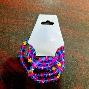 26 1/2in dark pink and purple belly chain with gold star spacers